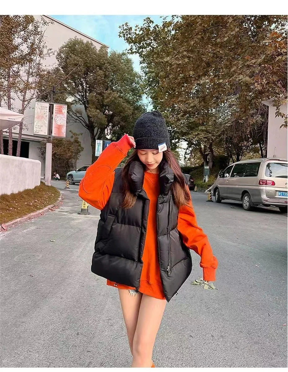 Women Fashion Autumn New 2025 Stand Collar Elegant Down Coats Warm Outerwear Casual Belt Sleeveless Winter Women Vests Jackets